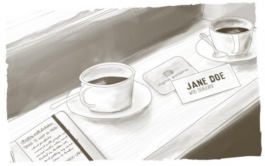 two cups of coffee name tag on desk