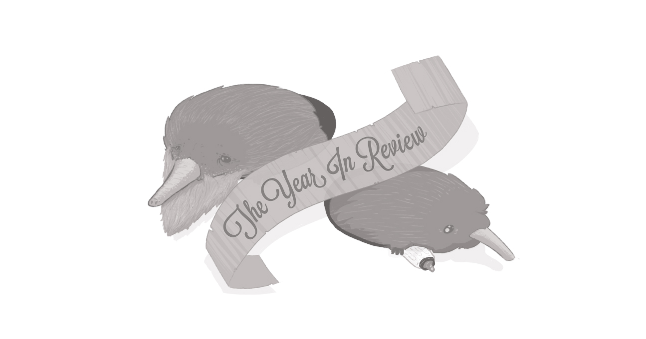 An image of an old echidna and a baby echidna, with a banner that reads "The Year in Review"