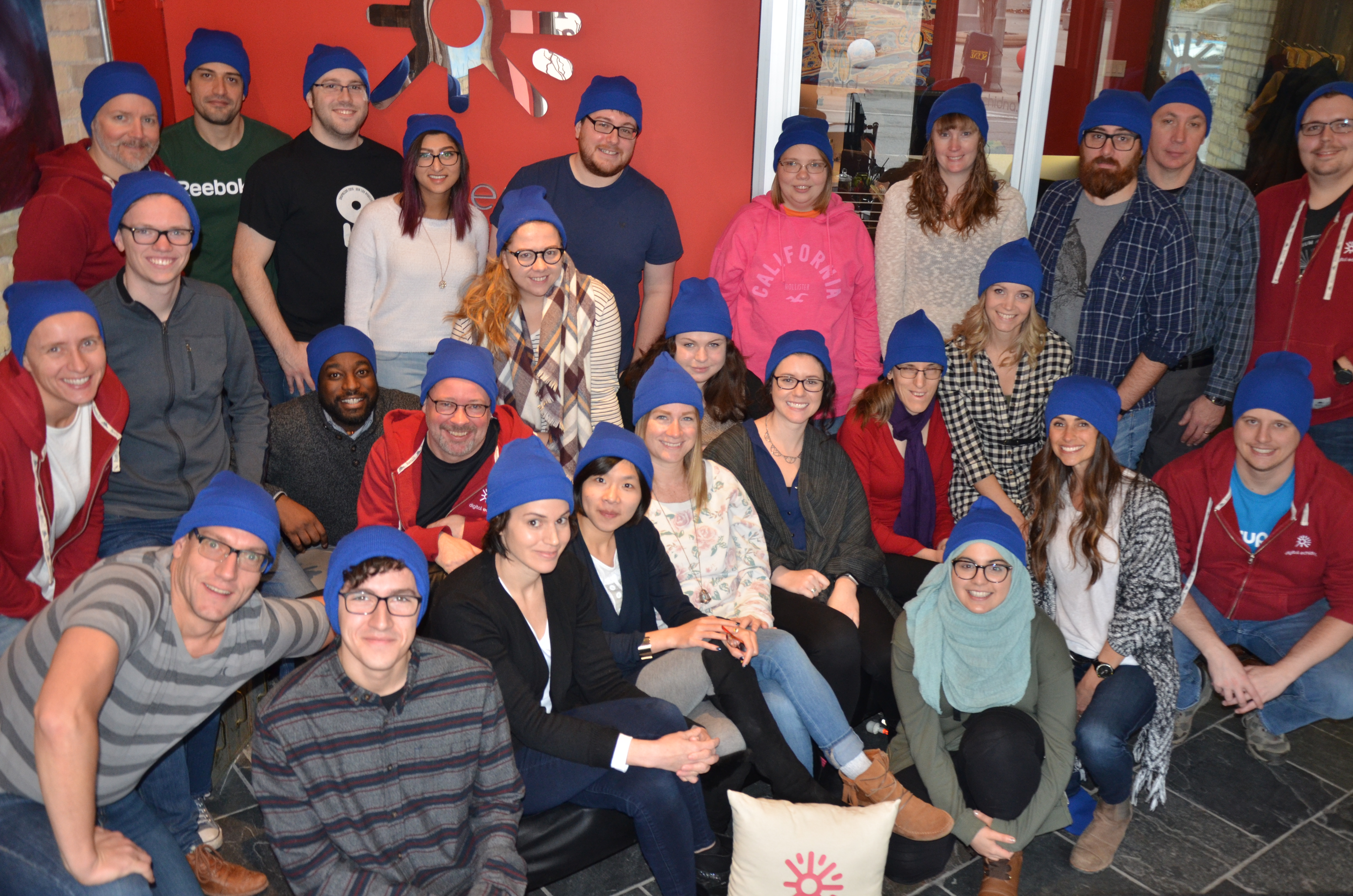 Some of the Digital Echidna team, wearing blue beanies in support of Blue Beanie Day