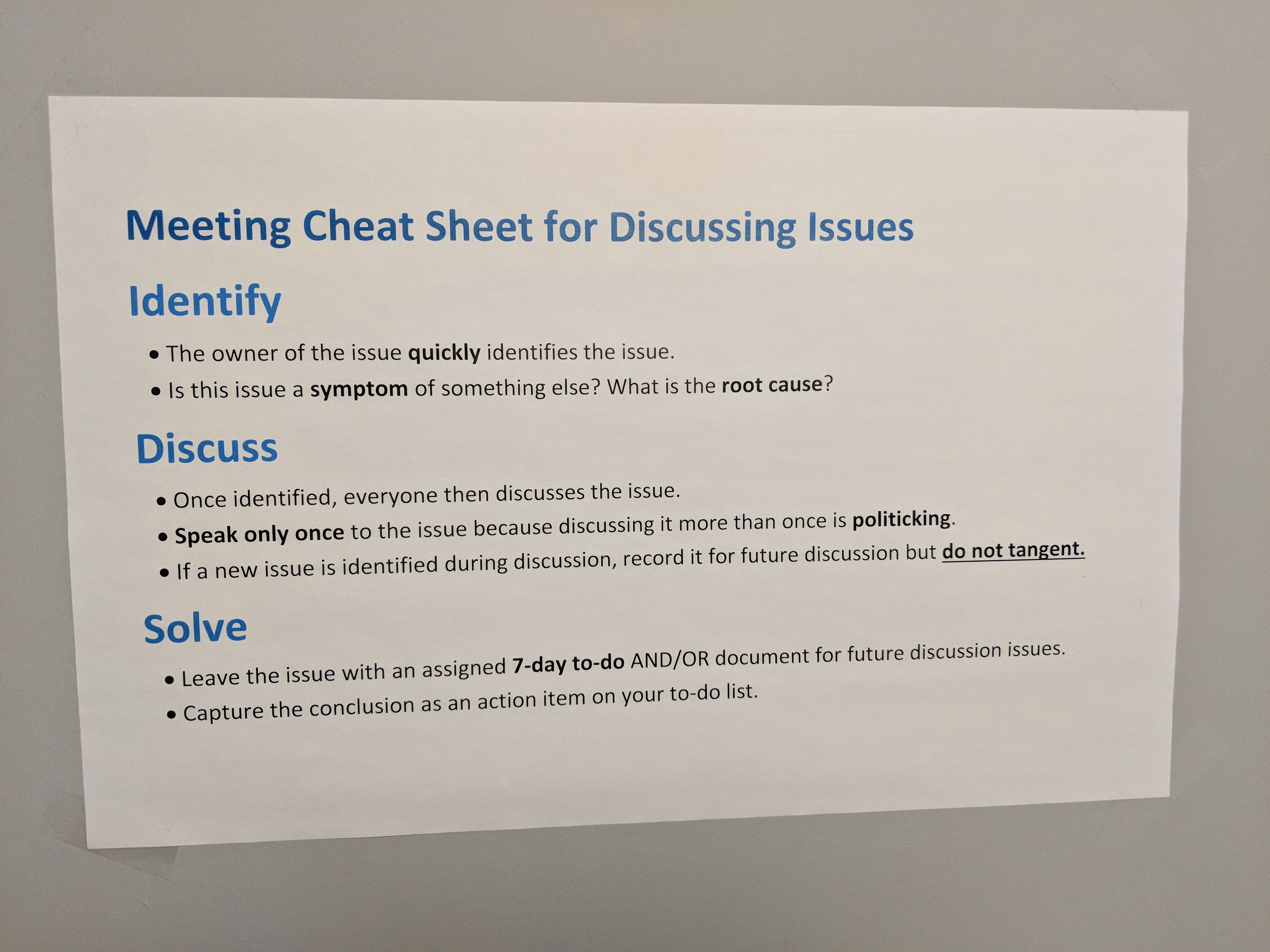 Cheat sheet posted in meeting rooms that outlines the Identify, Discussion, Solve (IDS) formula